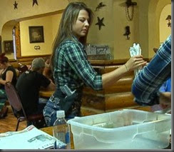 Lauren Bobert packing a 9mm semiautomatic hand gun open carry