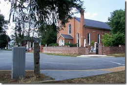 Post, marker and church where Lee worshiped in background
