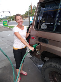 Mary gassing up the truck with Diesel