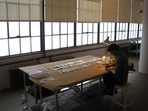 Carefully working from dark to light.