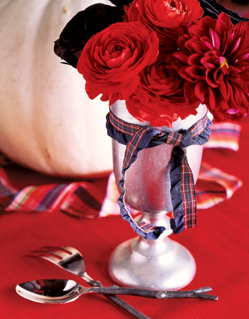 Simple small tartan ribbons are used as decoration (from Country Living).