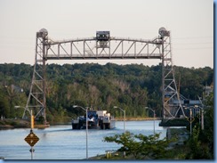 8017 St. Catharines - Welland Canals Centre at Lock 3 - Viewing Platform - Tug SPARTAN with barge SPARTAN II (a 407′ long tank barge) upbound under Glendale Lift Bridge