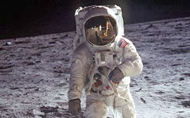 c0 Buzz Aldrin. Neil Armstrong is taking the  picture and can be seen in Aldrin's visor
