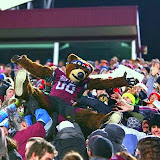 Monte surfs the student section.