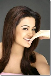 Surveen Chawla Hot Smile