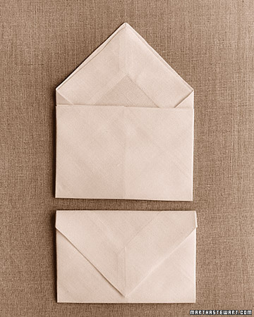 This simple design is among the easiest to do, and the folded napkins stack well. Treats or a place card can be tucked inside.