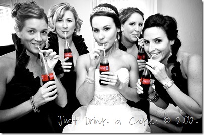 bride and bridesmaids drinking Cokes from a bottle