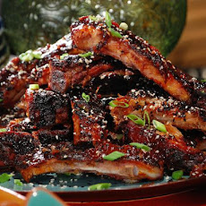 Asian Spice Rubbed Ribs with Pineapple-Ginger BBQ Sauce and Black and White Sesame Seeds