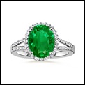 Oval-Emerald-and-Diamond-Split-Shank-Ring Oval-Emerald-and-Diamond-Split-Shank-Ring