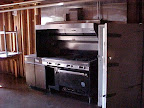 Four kitchens provide shared space for camper cooking.