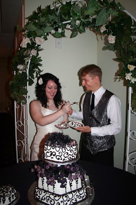 Heaven Sent Wedding Chapel, Hamilton Ohio. Great looking couple, cutting the cake. Wedding Venue, Ohio