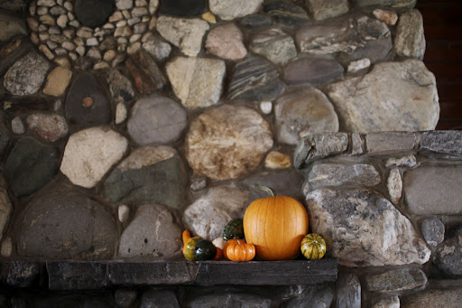 Fall pumpkins and gourds adorned the mantle to usher in the harvest feel of the season.