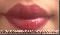 Butter licorice on lips in artificial light