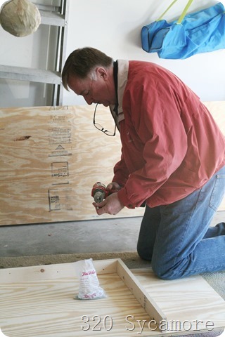 dad building shelf