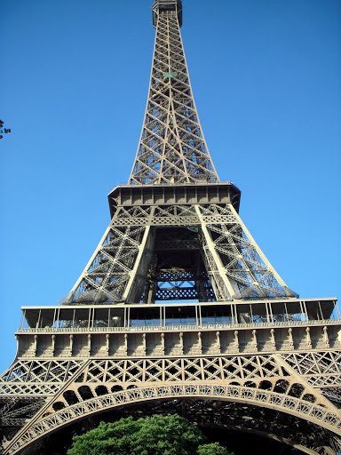Weighing in at 7,000 tons, the Eiffel Tower exerts about the same pressure on the ground as a person sitting in a chair.