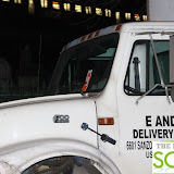 TrucksBeingTowedOffBayPkwy59StBreaking911