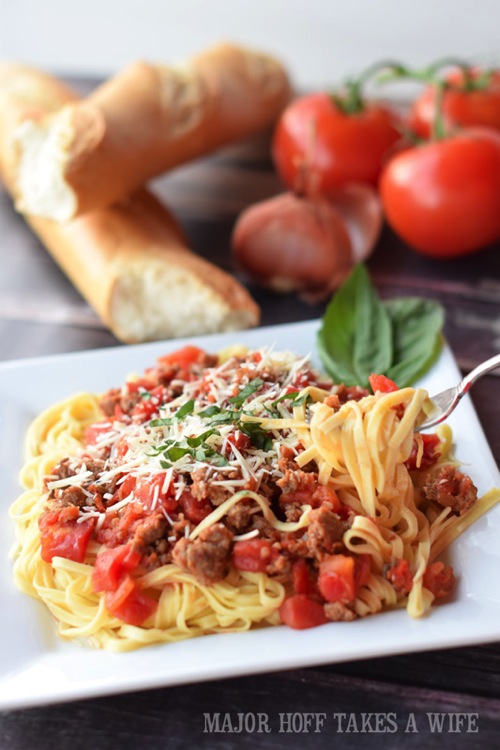 homemade spaghetti sauce served with linguine noodles. The perfect way to learn how to make homemade spaghetti sauce! In this learn to cook series, you will be taught everything you need to know to make the most scrumptious Italian Sausage Spaghetti Marinara Sauce. Part of the #TeachMeToCookSeries this meal is done and on the table in less than 30 minutes! WOW! #Pasta #spaghetti #homemade #Learntocook homemade spaghetti sauce served with linguine noodles. The perfect way to learn how to make homemade spaghetti sauce! In this learn to cook series, you will be taught everything you need to know to make the most scrumptious Italian Sausage Spaghetti Marinara Sauce. Part of the #TeachMeToCookSeries this meal is done and on the table in less than 30 minutes! WOW! #Pasta #spaghetti #homemade #Learntocook