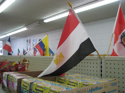 The Egyptian flag is one of many displayed in Mahmoud Salem's store, 