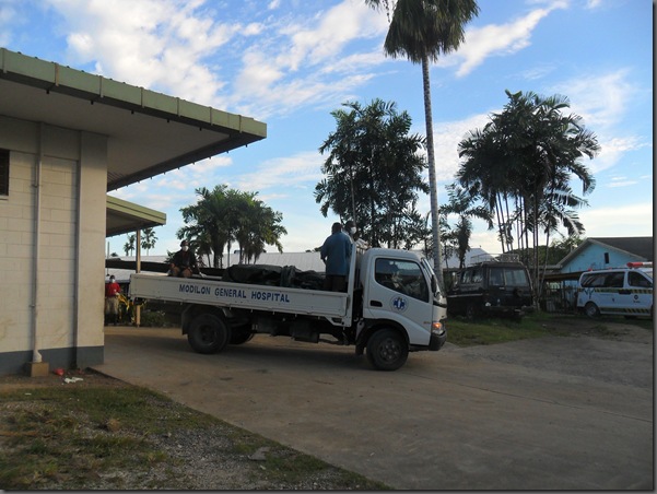 Bodies Arrive at Modilon General Hospital. by Martyn Namorong