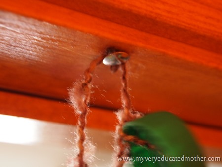 Bottle Cap Beaded Door - Tacking them in Doorway