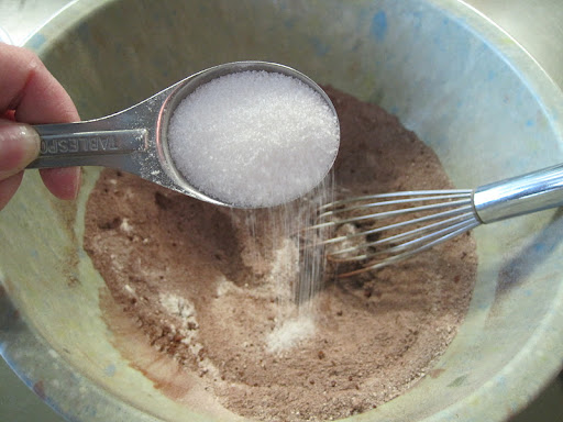 Add some sugar and whisk it all to combine.