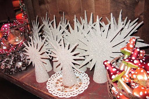 Serious sunburst tree-toppers. At John Derian, treasures are already glittered for you and it's not necessary to spend hours in the craft room!