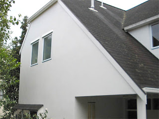 St Heliers Home. Waterproof coating to texture cladding after repair of cracks.