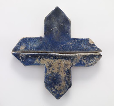 Half cruciform tiles (pair) | Origin:  Iran | Period: 13th-14th century? | Details:  Not Available | Type: Stone-paste painted with blue glaze | Size: H: 39.9  W: 10.2  cm | Museum Code: F1909.410-411 | Photograph and description taken from Freer and the Sackler (Smithsonian) Museums.