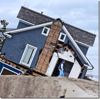 Sandy - Tilting house on beach in Mantoloking - April Saul  - Inquirer Staff Photographer