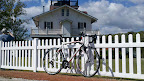Cycle NC 2011 - Spirited Cyclists 2012 Pinarello Paris in front Roanoke lighthouse in the Port of Plymouth.