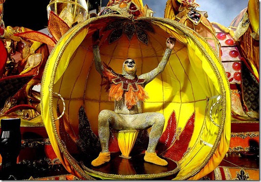 A dancer from the Dragoes da Real samba school performs on a float in Sao Paulo. (Andre Penner/Associated Press)