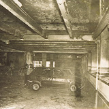 Damaged cars and totally burnt cars parked in the ground floor