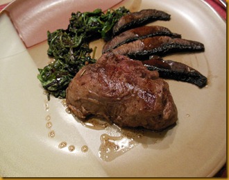 Grass-Fed filet mignon, portabella mushrooms, braised wild field greens and au jus