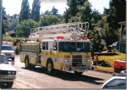 28 Rainier Fire District Pierce Aerial Ladder Truck in the Rainier Days in the Park Parade on July 13, 1996