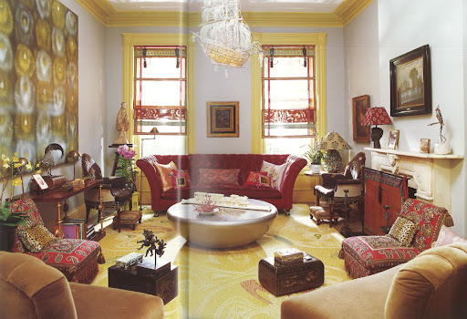 The furniture arrangement in this room is brilliantly balanced in both color and form.