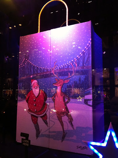 Bloomingdale's took a look back and featured vintage shopping bags from year's past. They also featured a clever social media element. Guests were invited at certain windows to step on a star in front of the window, and touch the lit up star. Your photo was taken and posted on Bloomingdale's Facebook wall, so much fun.