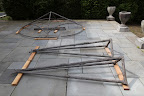 The patio has some strange wood-like structures on it.