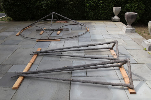 The patio has some strange wood-like structures on it.
