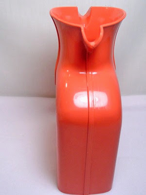 salmon pink Shel Glo double spout pitcher with stopper side salmon pink Shel Glo double spout pitcher with stopper side