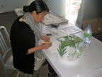 Katie making the leaves for the snow drops out of gum paste for the 