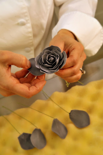 Ana adds the outer petals.