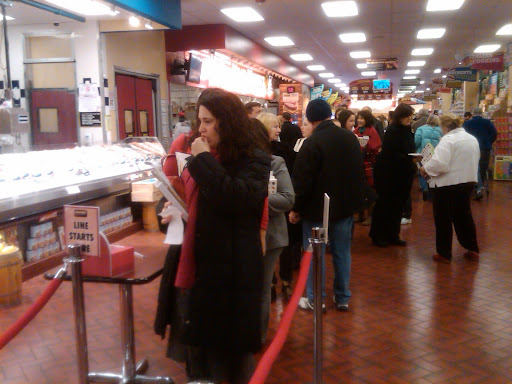 The line stretched back for the length of the store as people waited patiently to have their copies of Power Foods signed.