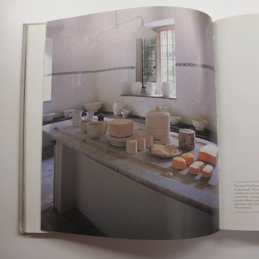 A charming image of white ceramics in a kitchen.