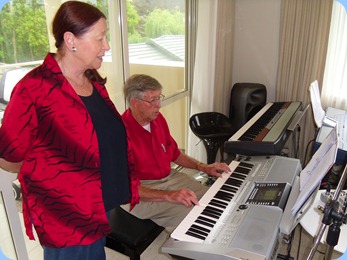 Annabelle Bramley watching-on whilst hubby, Michael, played and sang using the Yamaha PSR-910