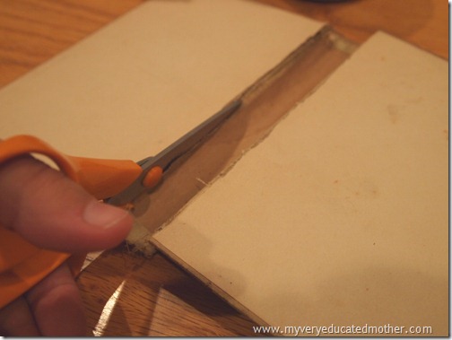 @mvemother Cutting out the book spines to make bookmarks @mvemother Cutting out the book spines to make bookmarks