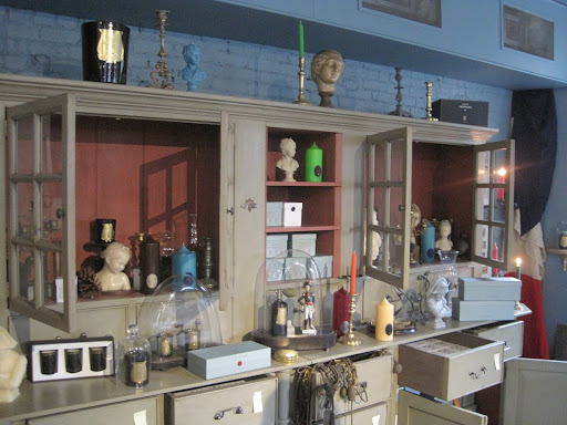 The store incorporates antiques into their displays that are for sale.