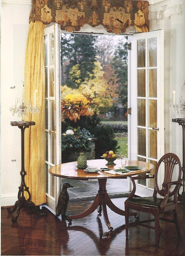 I love how the colors of this window treatment and the mahogany, satinwood and tulipwood pieces that decorate this breakfast nook perfectly complement the fall foliage. I love how the colors of this window treatment and the mahogany, satinwood and tulipwood pieces that decorate this breakfast nook perfectly complement the fall foliage.