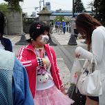 Japanese girl wearing mouthcap in Harajuku, Japan 