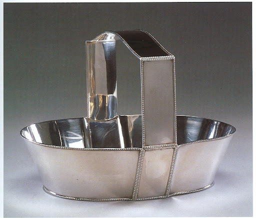 This fruit basket reminds me of the silver basket housing my Easter candy collection at the office, which is mysteriously looking more and more empty every day...