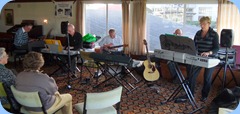 Roy Steen, Peter Brophy, Brian Gunson (electric guitar), Kevin Johnston (banjo), and Jan Johnston taking the lead on her Korg Pa1X